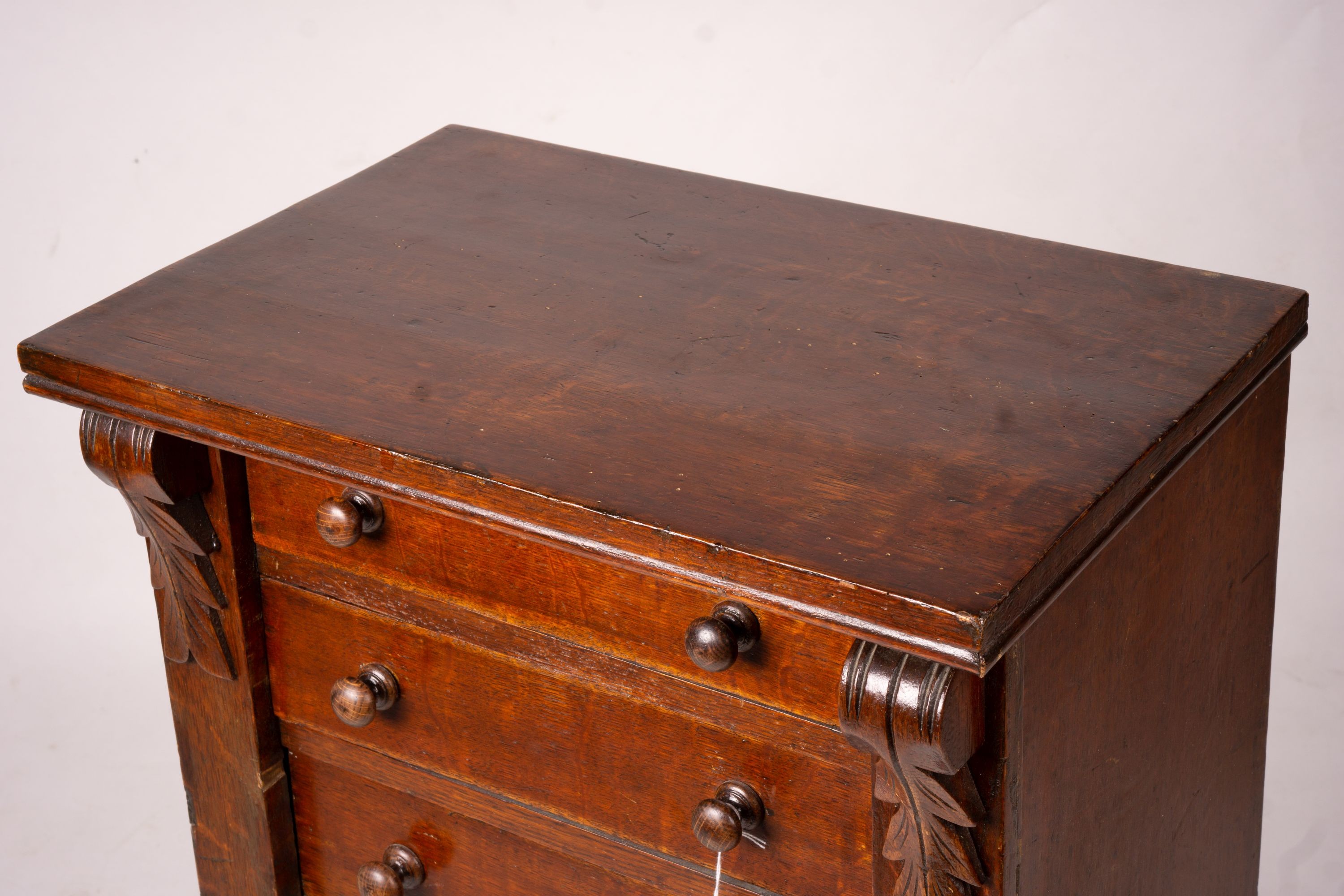 A late Victorian oak Wellington chest, width 51cm, depth 34cm, height 100cm